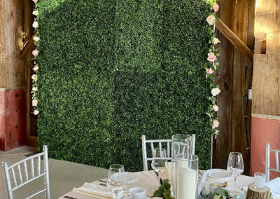 green boxwood flower wall