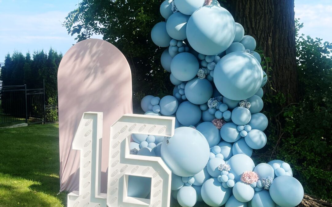 marquee numbers, a chiara arch and balloon decor