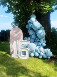 marquee numbers, a chiara arch and balloon decor