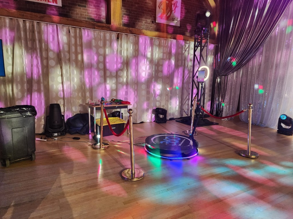 360 video booth with props and stanchions