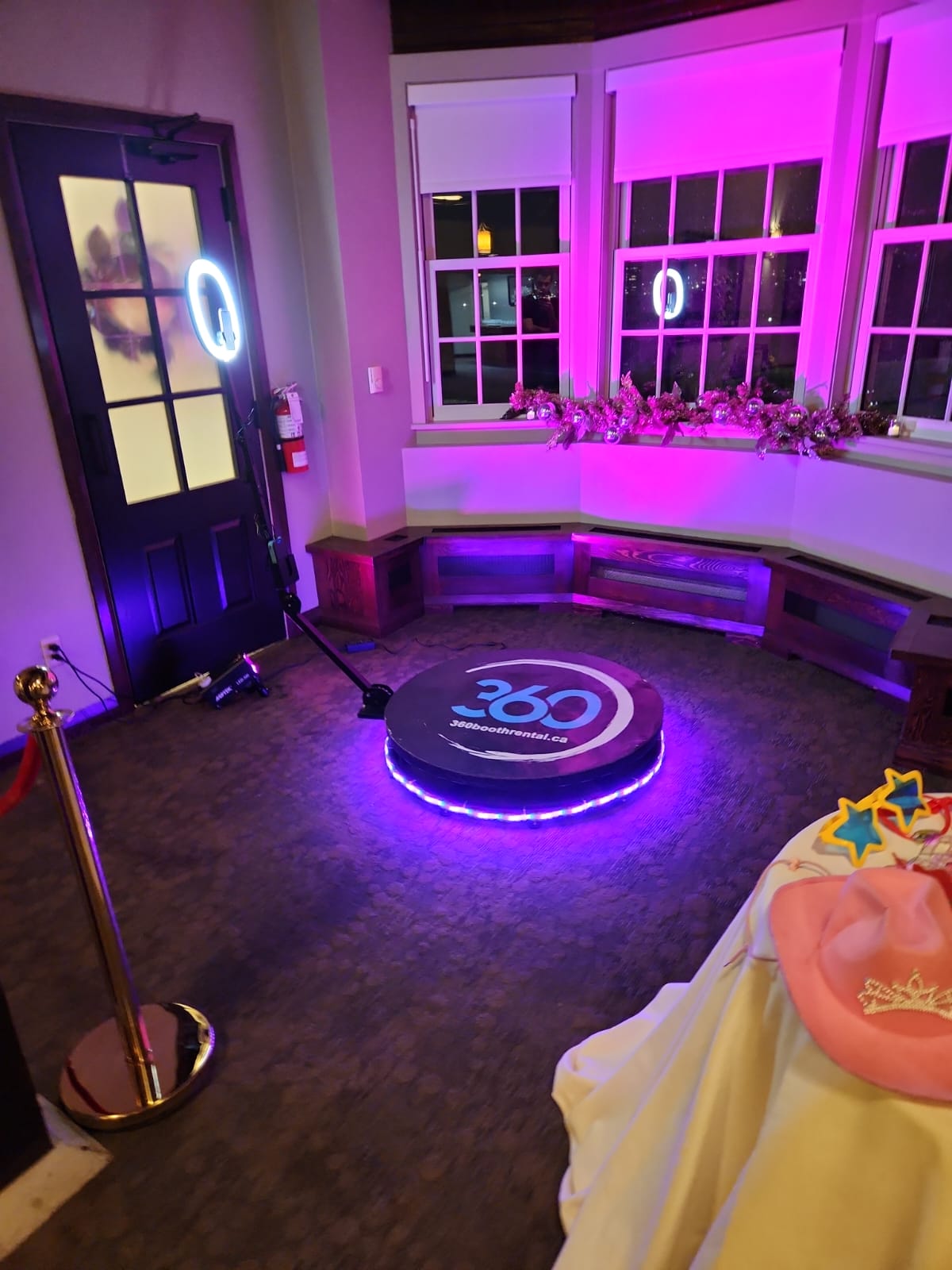 360 video booth with lights and props