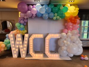 marquee letters, balloon arch and backdrop