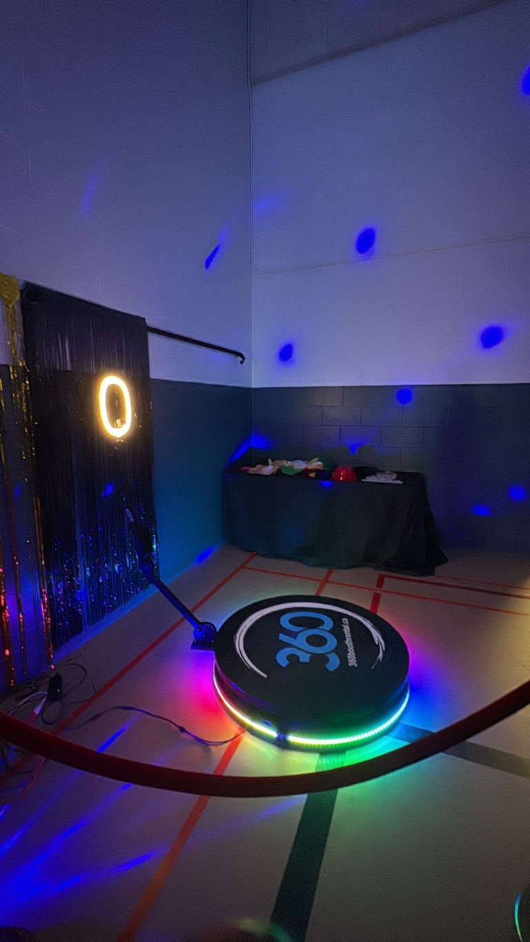 360 video booth with stanchions and lights